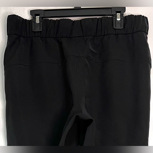 ✨LIKE NEW✨ Lululemon On The Fly Pant Woven 27" Black | Travel | Activewear - Picture 10 of 12